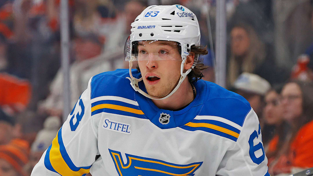 Jan 18, 2026; Edmonton, Alberta, CAN; St. Louis Blues forward Jake Neighbours (63) follows the play against the Edmonton Oilers at Rogers Place. Mandatory Credit: Perry Nelson-Imagn Images