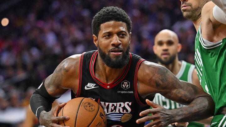 Apr 26, 2026; Philadelphia, Pennsylvania, USA; Philadelphia 76ers forward Paul George (8) is defended by Boston Celtics center Nikola Vucevic (4) during the second half at Xfinity Mobile Arena. Mandatory Credit: Eric Hartline-Imagn Images