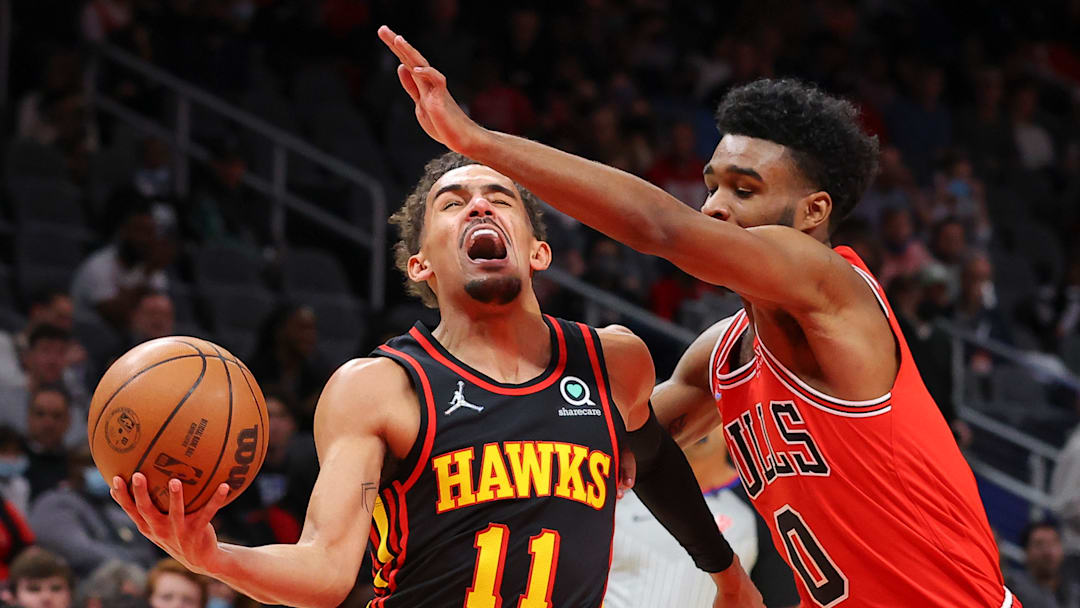 Coby White defends Trae Young during a game between the Chicago Bulls and Atlanta Hawks. Coby White defends Trae Young during a game between the Chicago Bulls and Atlanta Hawks.