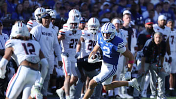Oct 12, 2024; Provo, Utah, USA; Brigham Young Cougars wide receiver Chase Roberts (2) runs with the ball after a catch against the Arizona Wildcats during the third quarter at LaVell Edwards Stadium. Mandatory Credit: Rob Gray-Imagn Images