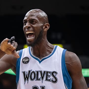 Dec 18, 2015; Minneapolis, MN, USA; Minnesota Timberwolves forward Kevin Garnett (21) celebrates after scoring in the third quarter against the Sacramento Kings at Target Center. The Timberwolves won 99-95. Mandatory Credit: Brad Rempel-Imagn Images