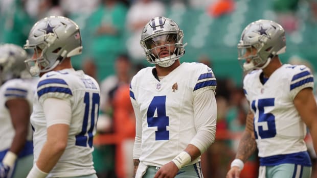 Dallas Cowboys quarterback Dak Prescott (4) warms-up before the NFL game against the Miami Dolphins at Hard Rock Stadium in M