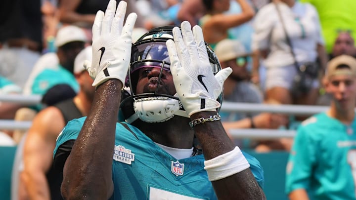 Sep 8, 2024; Miami Gardens, Florida, USA;  Jacksonville Jaguars wide receiver Brian Thomas Jr. (7) blows kisses to the fans after scoring a touchdown against the Miami Dolphins in the second quarter at Hard Rock Stadium. Mandatory Credit: Jim Rassol-Imagn Images