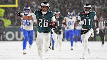 Jan 19, 2025; Philadelphia, Pennsylvania, USA; Philadelphia Eagles running back Saquon Barkley (26) runs for on a 78-yard touchdown run against the Los Angeles Rams during the fourth quarter in a 2025 NFC divisional round game at Lincoln Financial Field. Mandatory Credit: Eric Hartline-Imagn Images