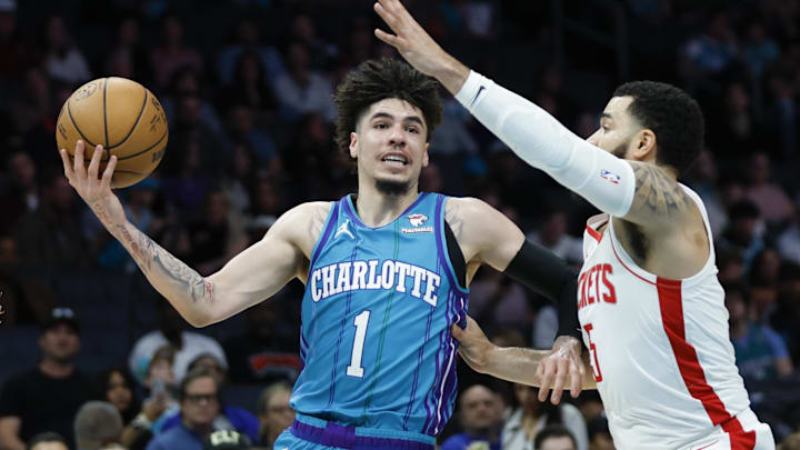 Jan 26, 2024; Charlotte, North Carolina, USA; Charlotte Hornets guard LaMelo Ball (1) moves against Houston Rockets guard Fred VanVleet (5) during the first quarter at Spectrum Center. Mandatory Credit: Nell Redmond-USA TODAY Sports