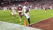 Oct 25, 2025; Columbia, South Carolina, USA; Alabama Crimson Tide wide receiver Germie Bernard (5) scores the game-winning touchdown against the South Carolina Gamecocks in the fourth quarter at Williams-Brice Stadium. Mandatory Credit: Jeff Blake-Imagn Images