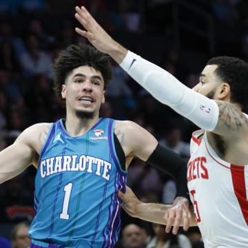 Jan 26, 2024; Charlotte, North Carolina, USA; Charlotte Hornets guard LaMelo Ball (1) moves against Houston Rockets guard Fred VanVleet (5) during the first quarter at Spectrum Center. Mandatory Credit: Nell Redmond-USA TODAY Sports