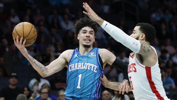 Jan 26, 2024; Charlotte, North Carolina, USA; Charlotte Hornets guard LaMelo Ball (1) moves against Houston Rockets guard Fred VanVleet (5) during the first quarter at Spectrum Center. Mandatory Credit: Nell Redmond-USA TODAY Sports