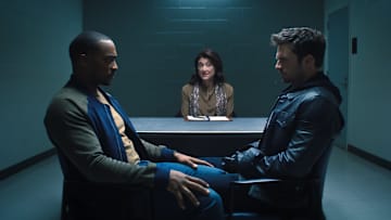 (L-R): Falcon/Sam Wilson (Anthony Mackie), therapist (Amy Aquino) and Winter Soldier/Bucky Barnes (Sebastian Stan) in Marvel Studios’ THE FALCON AND THE WINTER SOLDIER. Photo courtesy of Marvel Studios. ©Marvel Studios 2021. All Rights Reserved.
