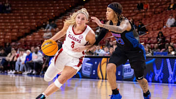 Mar 6, 2025; Greenville, SC, USA; Alabama Crimson Tide guard Sarah Ashlee Barker (3) drives on Florida Gators guard Liv McGill (23) during the second half at Bon Secours Wellness Arena. Mandatory Credit: Scott Kinser-Imagn Images