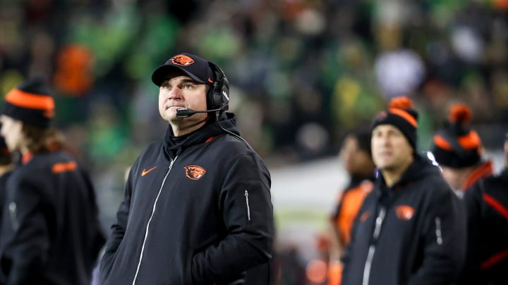 Oregon State Beavers head coach Jonathan Smith looks toward the scoreboard during the first half of the annual rivalry game on Friday, Nov. 24, 2023 at Autzen Stadium in Eugene, Ore.
