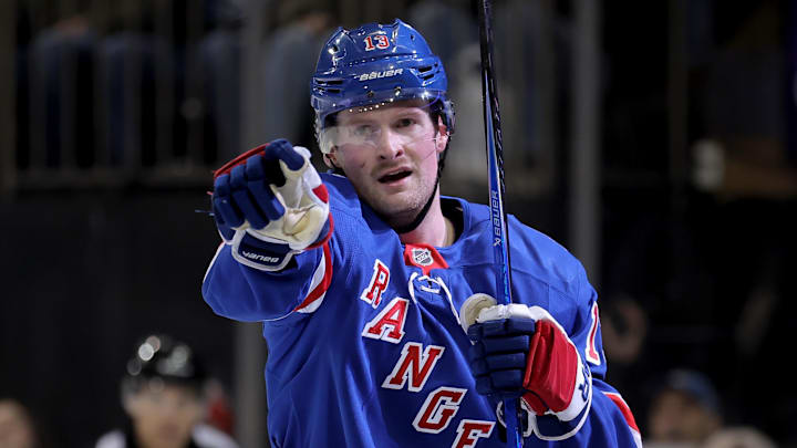 Jan 5, 2026; New York, New York, USA; New York Rangers left wing Alexis Lafreniere (13) celebrates his goal against the Utah Mammoth during the second period at Madison Square Garden. Mandatory Credit: Brad Penner-Imagn Images
