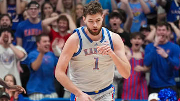 Jan 28, 2025; Lawrence, Kansas, USA; Kansas Jayhawks center Hunter Dickinson (1) celebrates after scoring against the UCF Knights during the first half at Allen Fieldhouse. 