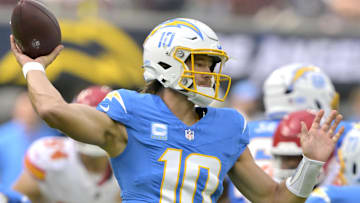 Sep 29, 2024; Inglewood, California, USA;  Los Angeles Chargers quarterback Justin Herbert (10) throws a pass in the first half against the Kansas City Chiefs at SoFi Stadium. Mandatory Credit: Jayne Kamin-Oncea-Imagn Images