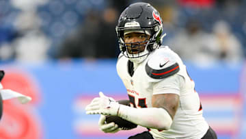 Jan 5, 2025; Nashville, Tennessee, USA; Former Houston Texans running back Dameon Pierce (31) runs the ball against the Tennessee Titans during the second half at Nissan Stadium.