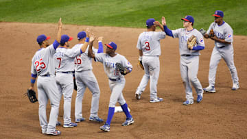 April 7, 2007: Chicago Cubs players high five each other after defeating the Milwaukee Brewers 6-3 at Miller Park. 