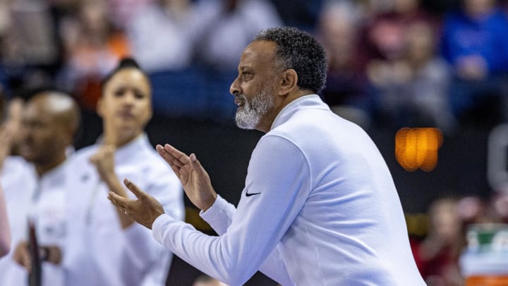 Mar 9, 2024; Greensboro, NC, USA; Virginia Tech Hokies head coach Kenny Brooks applauds his team in the first half against the Notre Dame Fighting Irish at Greensboro Coliseum. Mandatory Credit: David Yeazell-USA TODAY Sports