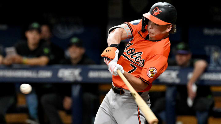 Aug 10, 2024; St. Petersburg, Florida, USA; Baltimore Orioles second baseman Jackson Holliday (7) hits a solo home run in the second inning against the Tampa Bay Rays at Tropicana Field.