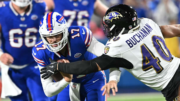 Buffalo Bills quarterback Josh Allen and Baltimore Ravens linebacker Teddye Buchanan