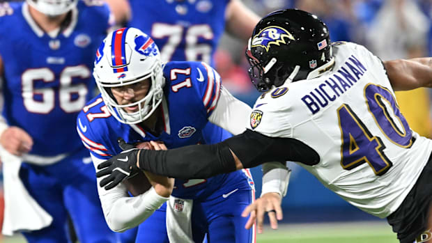 Buffalo Bills quarterback Josh Allen and Baltimore Ravens linebacker Teddye Buchanan