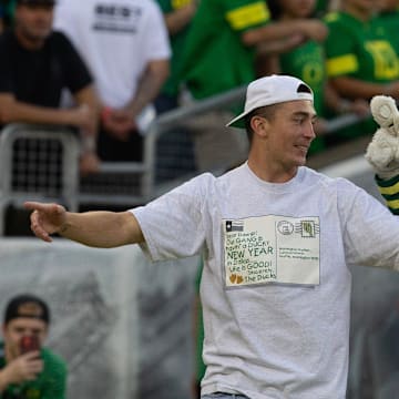 Former Duck Payton Pritchard is introduced to the crowd during the Duck game against Boise State at Autzen Stadium in Eugene Sept. 7, 2024