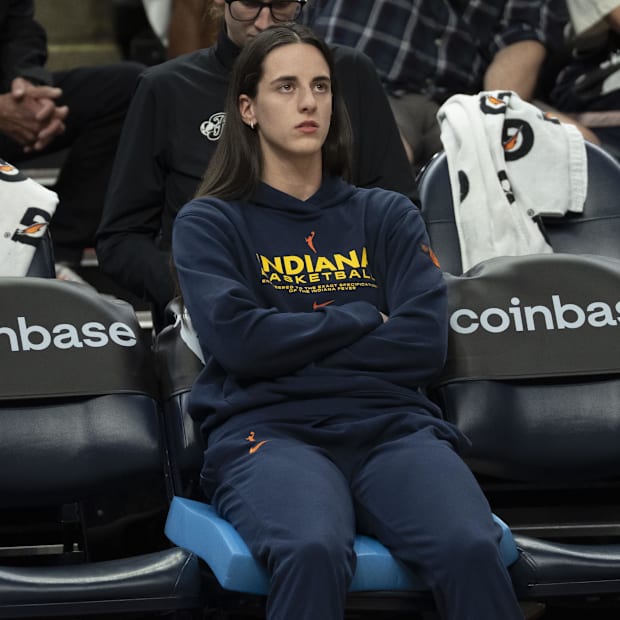 Injured Caitlin Clark celebrates as bartender for Fever’s Commissioner