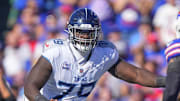 Tennessee Titans center Lloyd Cushenberry III looks to block against the Buffalo Bills during the first half. Mandatory Credit: Gregory Fisher-Imagn Images