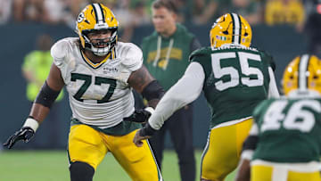 Green Bay Packers offensive lineman Jordan Morgan (77) blocks during Family Night on Saturday, August 2, 2025, at Lambeau Field in Green Bay, Wis. 
Tork Mason/USA TODAY NETWORK-Wisconsin
