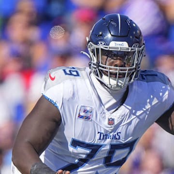 Tennessee Titans center Lloyd Cushenberry III looks to block against the Buffalo Bills. Mandatory Credit: Gregory Fisher-Imagn Images