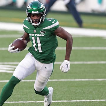 Nov 29, 2020; East Rutherford, New Jersey, USA; New York Jets wide receiver Denzel Mims (11) gains yards after the catch during the second half against the Miami Dolphins at MetLife Stadium. Mandatory Credit: Vincent Carchietta-Imagn Images