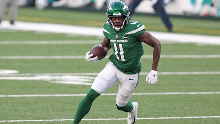 Nov 29, 2020; East Rutherford, New Jersey, USA; New York Jets wide receiver Denzel Mims (11) gains yards after the catch during the second half against the Miami Dolphins at MetLife Stadium. Mandatory Credit: Vincent Carchietta-Imagn Images