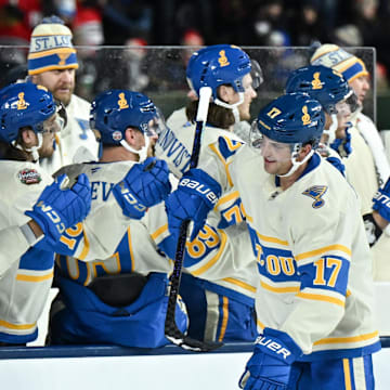 Cam Fowler and his Blues teammates celebrate his goal against the Blackhawks.