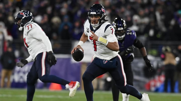 Jan 20, 2024; Baltimore, MD, USA; Houston Texans quarterback C.J. Stroud (7) runs the ball against the Baltimore Ravens during the second quarter of a 2024 AFC divisional round game at M&T Bank Stadium. Mandatory Credit: Tommy Gilligan-USA TODAY Sports