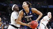 Mar 31, 2019; Albany , NY, USA; UConn Huskies forward Napheesa Collier (24) drives to the basket against Louisville Cardinals forward Bionca Dunham (left) during the second half in the championship game of the Albany regional in the women's 2019 NCAA Tournament at Times Union Center. Mandatory Credit: Rich Barnes-Imagn Images