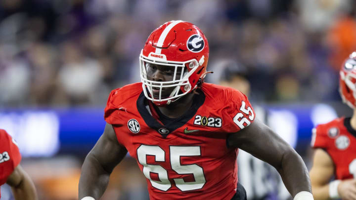 Jan 9, 2023; Inglewood, CA, USA; Georgia Bulldogs offensive lineman Amarius Mims (65) against the TCU Horned Frogs during the CFP national championship game at SoFi Stadium. Mandatory Credit: Mark J. Rebilas-USA TODAY Sports