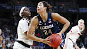 Mar 31, 2019; Albany , NY, USA; UConn Huskies forward Napheesa Collier (24) drives to the basket against Louisville Cardinals forward Bionca Dunham (left) during the second half in the championship game of the Albany regional in the women's 2019 NCAA Tournament at Times Union Center. Mandatory Credit: Rich Barnes-Imagn Images