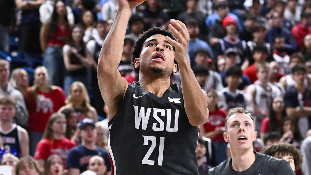 Feb 10, 2026; Spokane, Washington, USA; Washington State Cougars guard Ace Glass (21) shoots the ball against the Gonzaga Bulldogs in the second half at McCarthey Athletic Center. Mandatory Credit: James Snook-Imagn Images