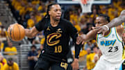 May 9, 2025; Indianapolis, Indiana, USA; Cleveland Cavaliers guard Darius Garland (10) dribbles the ball while Indiana Pacers forward Aaron Nesmith (23) defends during game three of the second round for the 2025 NBA Playoffs at Gainbridge Fieldhouse. Mandatory Credit: Trevor Ruszkowski-Imagn Images