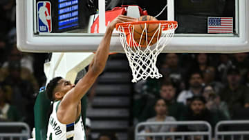 Oct 14, 2025; Milwaukee, Wisconsin, USA; Milwaukee Bucks forward Giannis Antetokounmpo (34) dunks against the Oklahoma City Thunder during the second half at Fiserv Forum. Mandatory Credit: Patrick Gorski-Imagn Images
