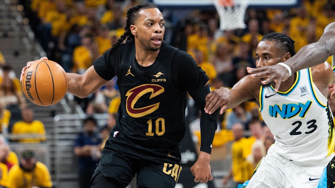 May 9, 2025; Indianapolis, Indiana, USA; Cleveland Cavaliers guard Darius Garland (10) dribbles the ball while Indiana Pacers forward Aaron Nesmith (23) defends during game three of the second round for the 2025 NBA Playoffs at Gainbridge Fieldhouse. Mandatory Credit: Trevor Ruszkowski-Imagn Images