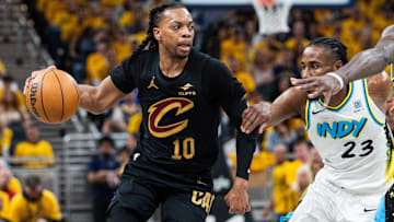 May 9, 2025; Indianapolis, Indiana, USA; Cleveland Cavaliers guard Darius Garland (10) dribbles the ball while Indiana Pacers forward Aaron Nesmith (23) defends during game three of the second round for the 2025 NBA Playoffs at Gainbridge Fieldhouse. Mandatory Credit: Trevor Ruszkowski-Imagn Images