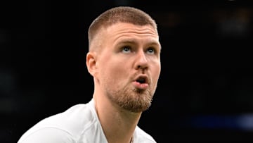 Kristaps Porzingis #8 of the Boston Celtics warms up before facing the Minnesota Timberwolves.