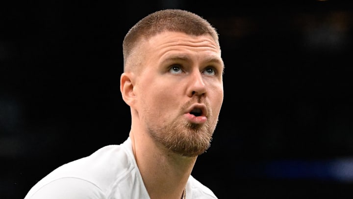 Kristaps Porzingis #8 of the Boston Celtics warms up before facing the Minnesota Timberwolves.