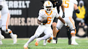 Nov 30, 2024; Nashville, Tennessee, USA;  Tennessee Volunteers running back Dylan Sampson (6) runs the ball against the Vanderbilt Commodores during the second half at FirstBank Stadium. 