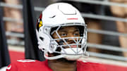 Aug 9, 2025; Glendale, Arizona, USA; Arizona Cardinals offensive tackle Paris Johnson Jr. (70) against the Kansas City Chiefs during a preseason NFL game at State Farm Stadium. Mandatory Credit: Mark J. Rebilas-Imagn Images