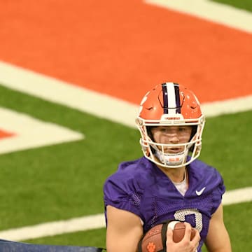 Clemson quarterback Cade Klubnik (2) in a drill with quarterback Christopher Vizzina (17) during Spring practice at the Poe Indoor Practice Facility at the Allen N. Reeves football complex in Clemson S.C. Friday, March 1, 2024.