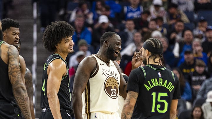 Nov 29, 2025; San Francisco, California, USA; Golden State Warriors forward Draymond Green (23) has words with New Orleans Pelicans guard Jose Alvarado (15) and guard Micah Peavy (14) during the second quarter at Chase Center. Mandatory Credit: John Hefti-Imagn Images
