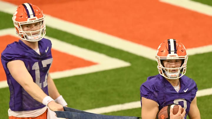 Clemson quarterback Cade Klubnik (2) in a drill with quarterback Christopher Vizzina (17) during Spring practice at the Poe Indoor Practice Facility at the Allen N. Reeves football complex in Clemson S.C. Friday, March 1, 2024.