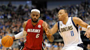 Dec 25, 2011; Dallas, TX, USA; Miami Heat small forward LeBron James (6) dribbles past a defending Dallas Mavericks small forward Shawn Marion (0) during the fourth quarter at the American Airlines Center. The Heat defeated the Mavericks 105-94. Mandatory Credit: Jerome Miron-Imagn Images