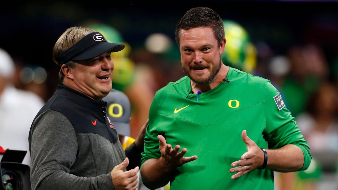 Georgia head coach Kirby Smart and Oregon head coach Dan Lanning meet during warm ups before the start of the Chick-fil-A Kickoff NCAA college football game between Oregon and Georgia in Atlanta, on Saturday, Sept. 3, 2022.

News Joshua L Jones